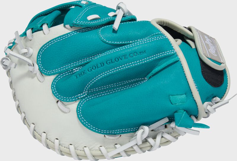 Finger backs of a white/teal Shut Out 31.5-inch Fastpitch Softball Catcher's Mitt