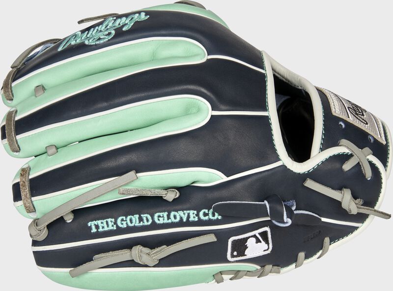 Navy/mint back of a Seattle Mariners Heart of the Hide infield glove with the MLB logo on the pinky - SKU: RSGPRO314-2SEA