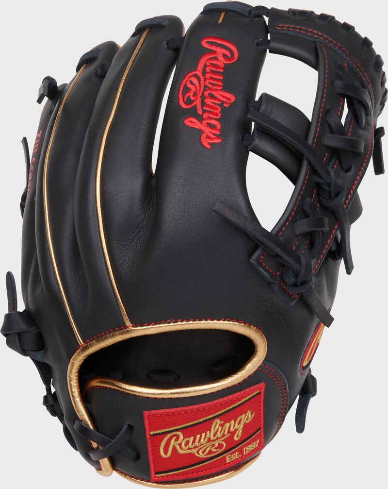 Back of a dark shadow NXT 11.5" Infield glove with a red Rawlings patch