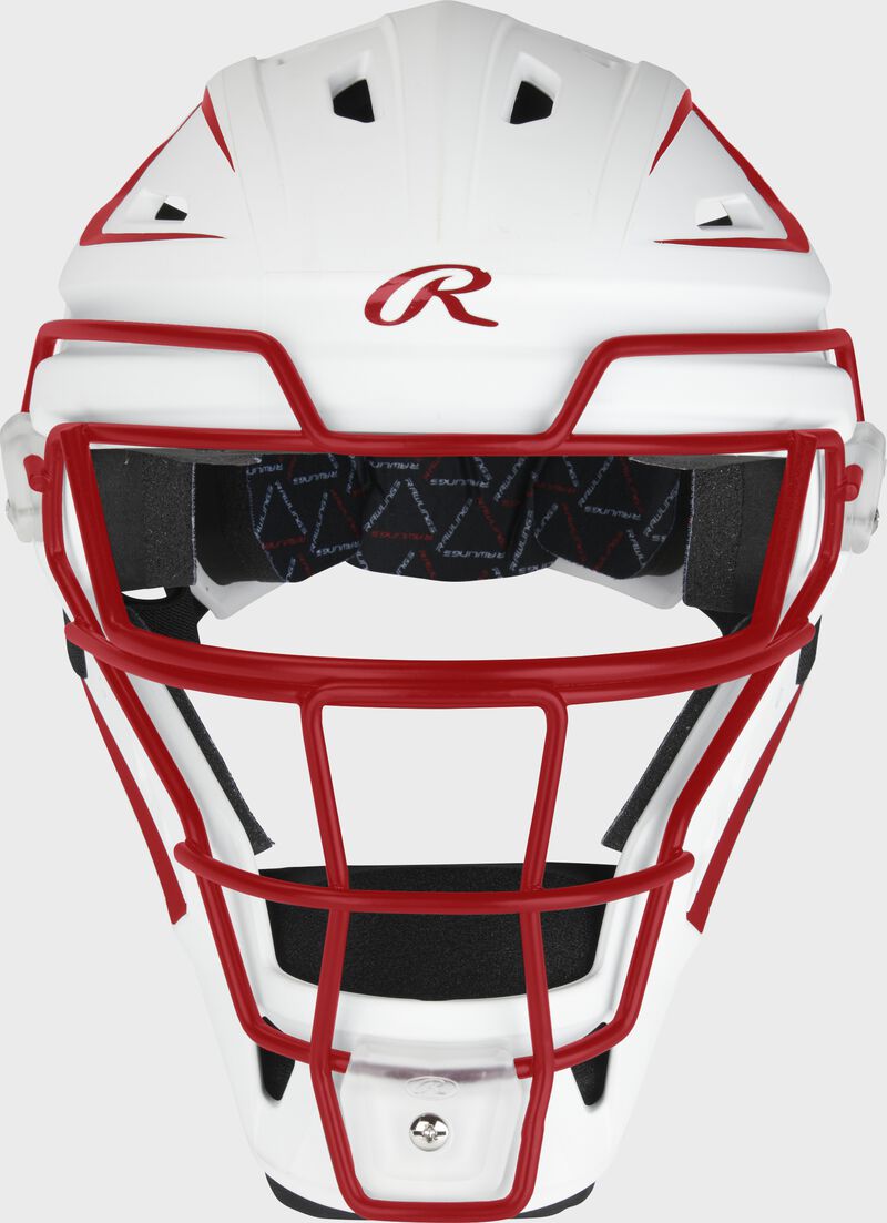 Front of a white/scarlet Velo catcher's mask