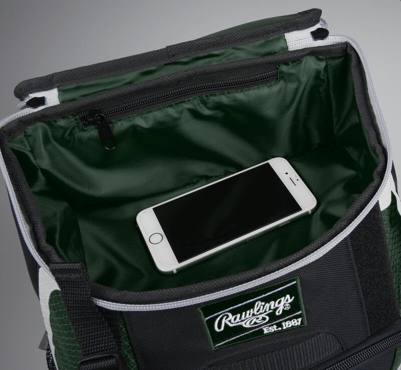 Top accessory pocket of a black/dark green R500 equipment backpack holding a phone