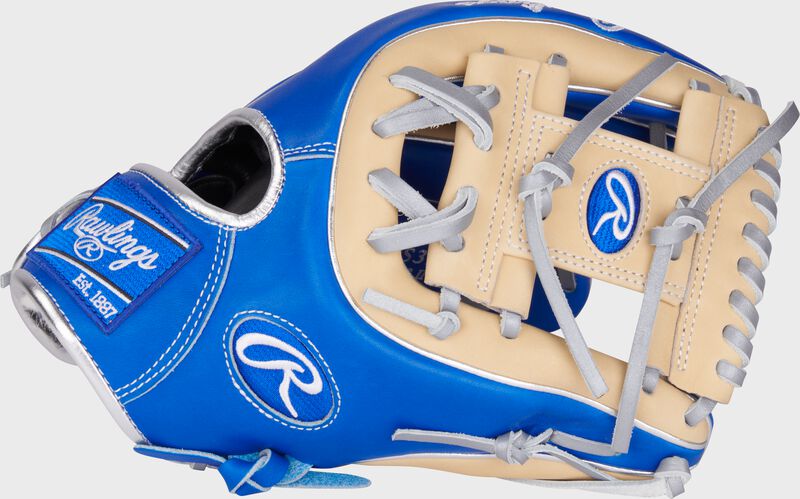 Thumb of a royal/camel Pro Preferred 11.5" infield glove with a camel I-web