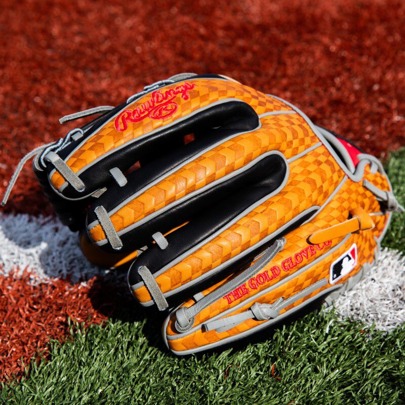Tan/black back fingers of a HOH ColorSync 8.0 infield glove on a field