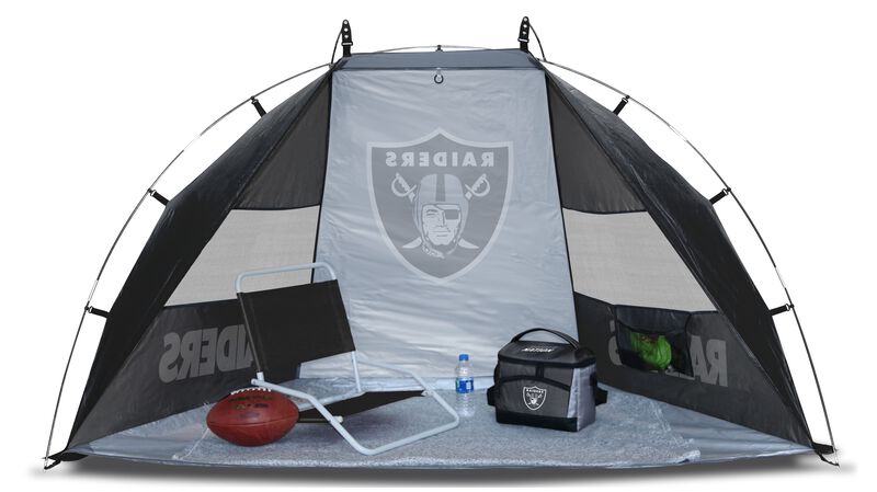 A Las Vegas Raiders sun shelter set up with a chair, cooler, football and water bottle on the ground - SKU: 00961072111