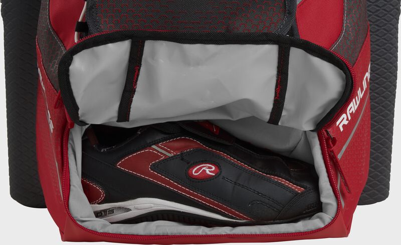 A scarlet Rawlings baseball backpack with a cleat in the bottom cleat storage compartment - SKU: IMPLSE-S loading=
