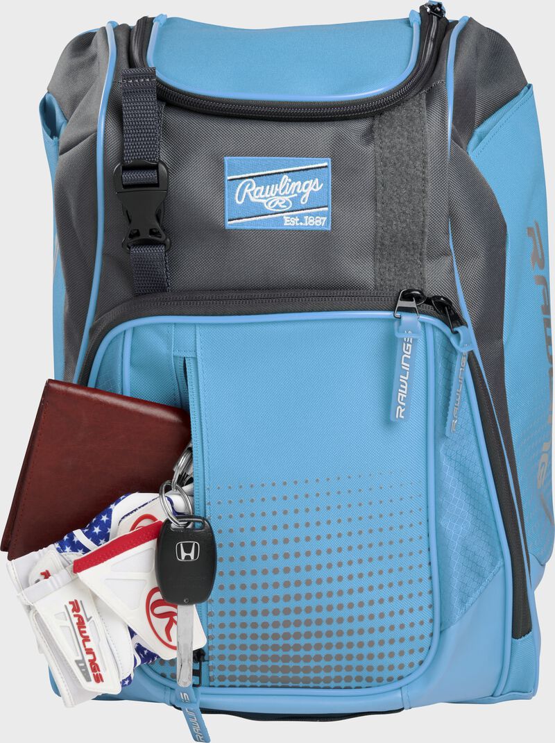 Wallet, keys, and batting gloves in the front valuables pocket of a Columbia blue Franchise baseball bag - SKU: FRANBP-CB