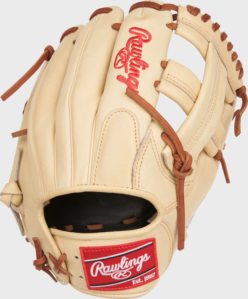 Back of a camel Heart of the Hide Trea Turner 11.5" infield glove with a red Rawlings patch - SKU: PRONP4-1TT