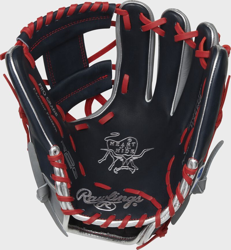 Navy palm of a Rawlings Heart of the Hide R2G glove with scarlet laces and a silver palm stamp - SKU: PRORFL12N image number null