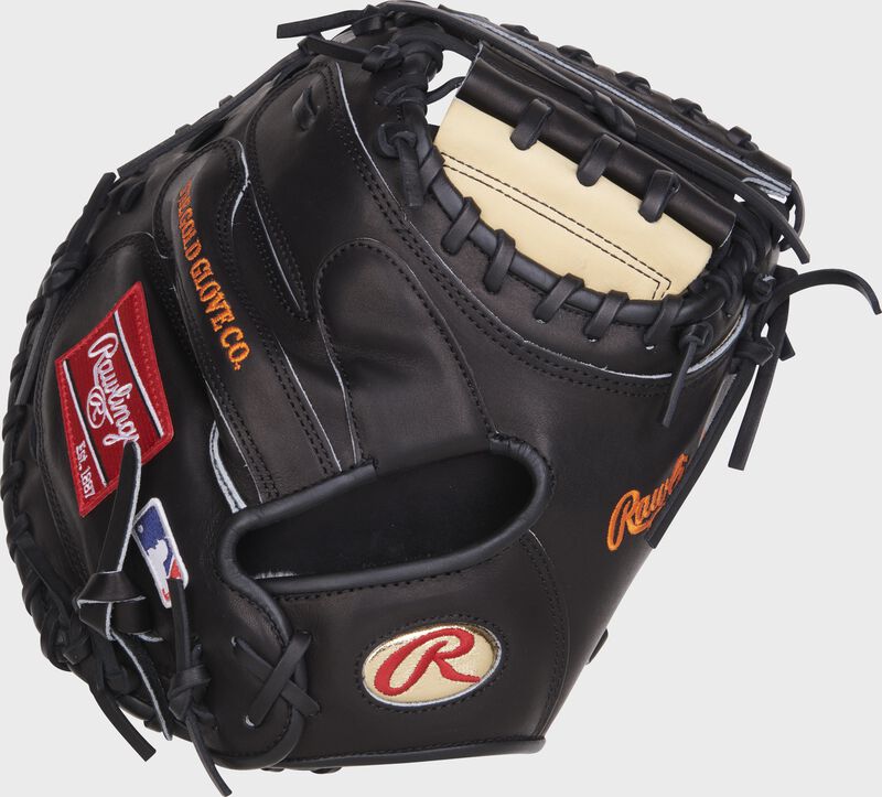 Black Back of a Tucker Barnhart Gamedy 57 catcher's mitt with a Gold Oval-R on the wrist - SKU: RPROSCM33TB-RHT