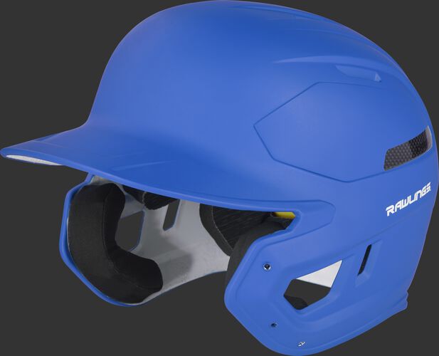 Left angle view of a matte royal CAR07A MACH Carbon high school/college batting helmet