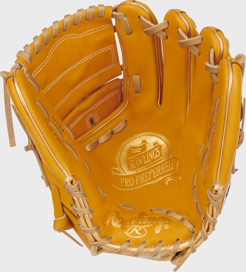 Tan palm of a Rawlings Pro Preferred Shane Bieber glove with gold stamping