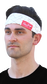 A guy wearing a white Rawlings multi-purpose neck gaiter as a head band - SKU: RC40005-100 image number null