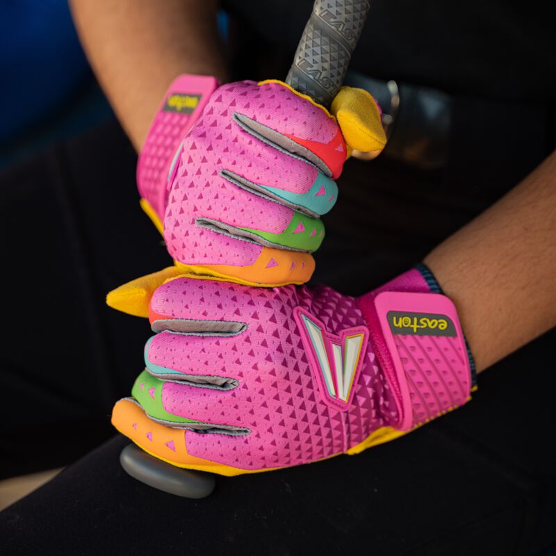 Picture of two hands wearing pink Easton x Happiness Project Ghost NX fastpitch batting gloves holding a bat loading=