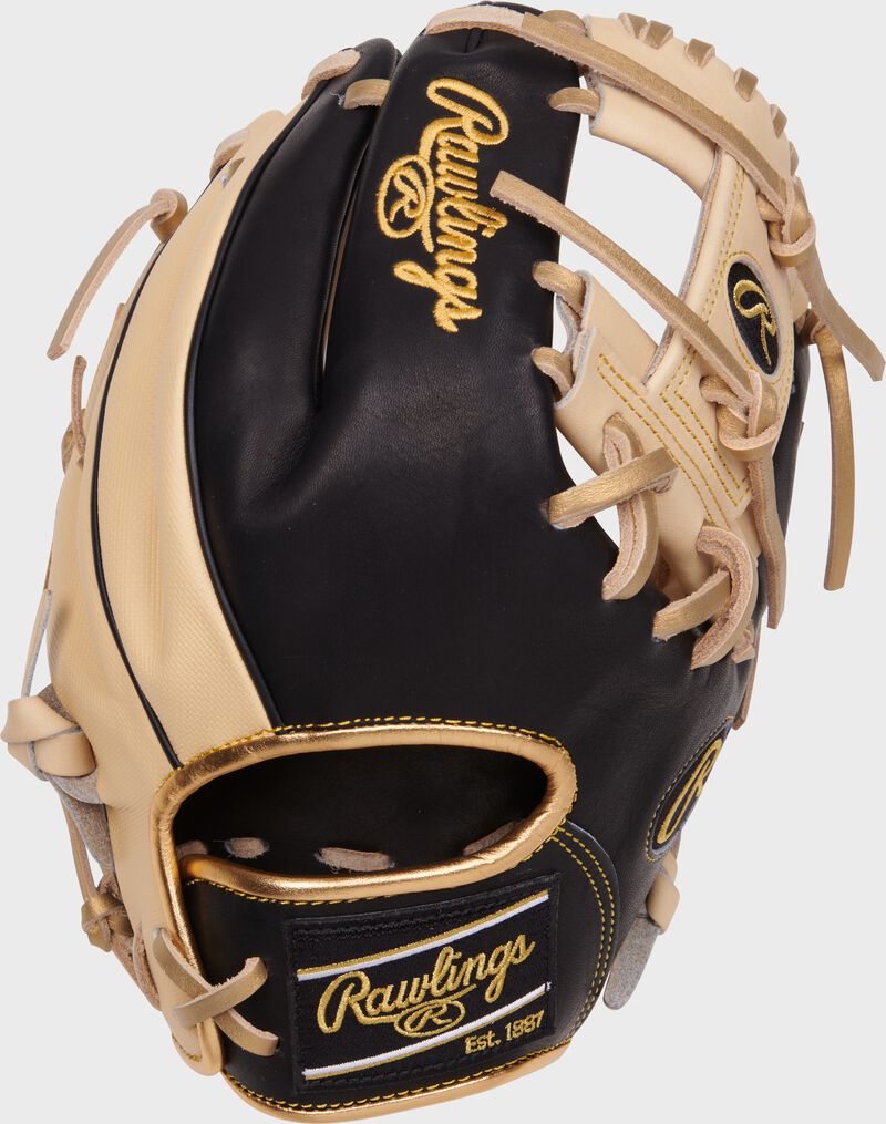 Camel/black back of a Heart of the Hide 11.5" ContoUR fit I-web glove with a black Rawlings patch