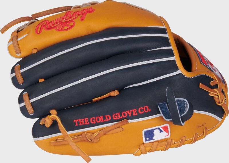 Navy/tan back of a Heart of the Hide 11.5" Infield glove with the MLB logo on the pinky