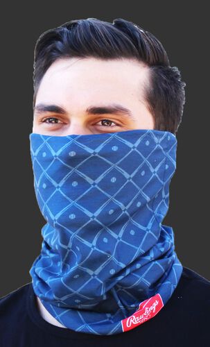 A guy wearing a navy Rawlings adult multi-functional head and face cover around his mouth and nose - SKU: RC40005-400
