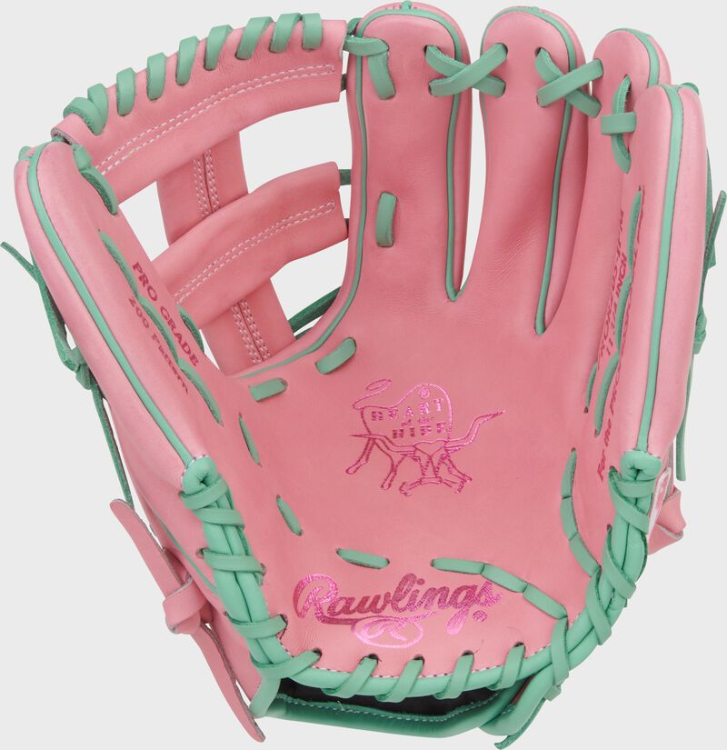 Palm of a Rawlings Heart of the Hide 11.75-Inch Pink Infield Glove with mint laces