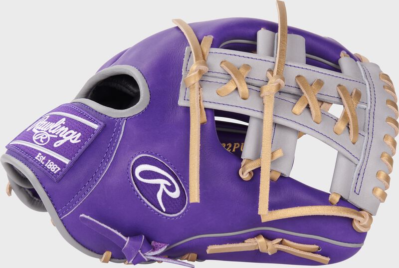 Thumb of an exclusive 11.5" Heart of the Hide purple infield glove with a gray split, X-laced Single Post web