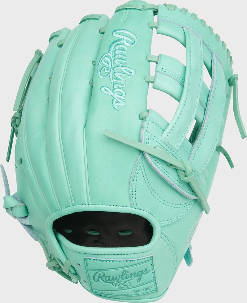 Back of a Heart of the Hide 12.75-Inch Mint Outfield Glove with a mint leather Rawlings patch