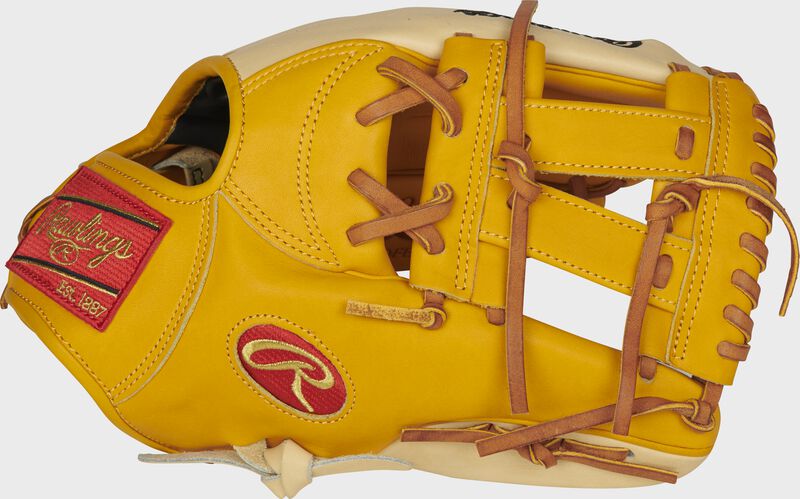Thumb of a gold tan/camel PRONP5-7GT Heart of the Hide 11.75-Inch infield glove with a gold tan V-Web