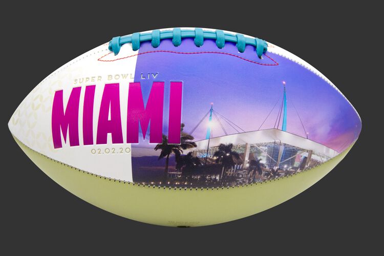 Back of a Patrick Mahomes MVP football with a printed picture of the stadium from the Super Bowl