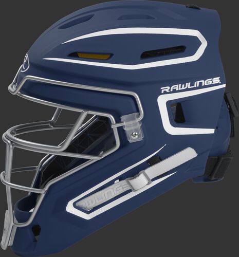Left side of a navy CHMCHJ Rawlings junior hockey style Mach catcher's helmet