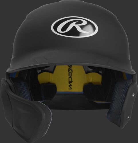 Front of a matte black MACHEXTL junior size Mach batting helmet with face guard extension for left hand batters