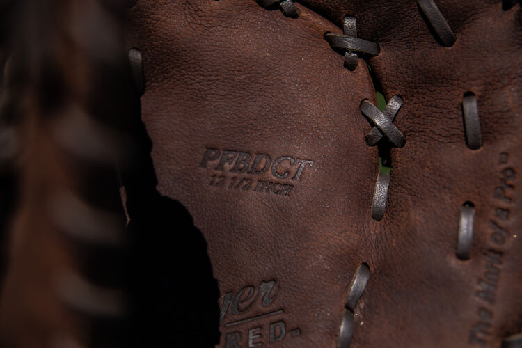 PFBDCT sku stamped on the palm of a Player Preferred first base mitt