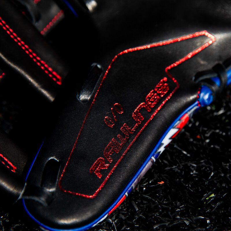 Limited edition stamp in red on the thumb of a Grateful Dead REV1X glove