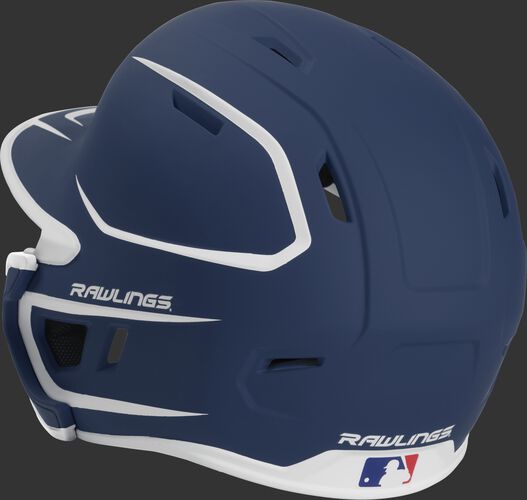 Back left view of a matte navy/white MACHEXTR MACH series two-tone batting helmet with air vents