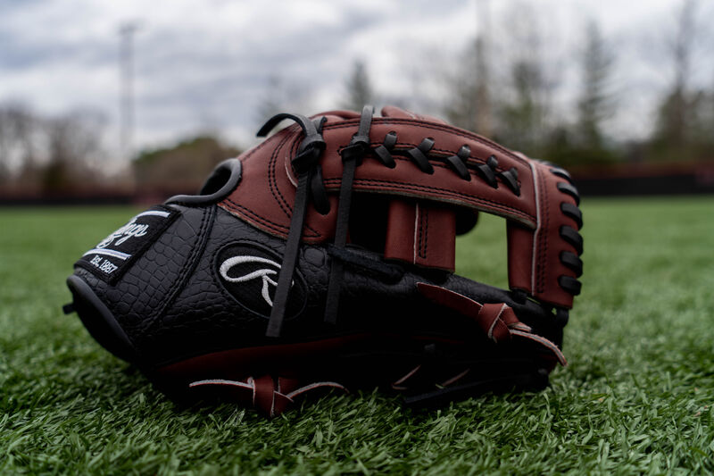 Thumb of a 2020 HOH exclusive Croc infield glove sitting on a field - SKU: PROTT2-19SHC