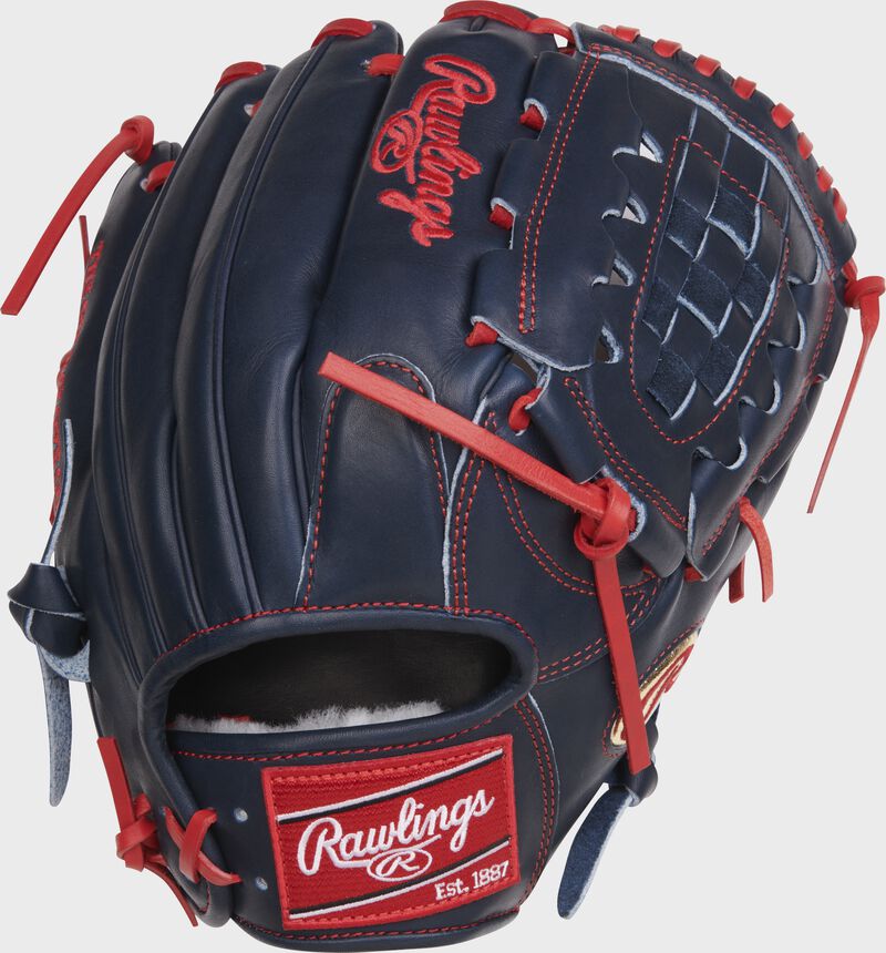 Back of a navy Griffin Canning Gameday 57 Pro Preferred glove with a red Rawlings patch - SKU: RSGRPROS19-11GC