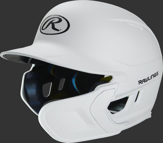 Left angle view of a matte white MACHEXTR Mach Junior helmet with Mach EXT right hand batter face guard extension