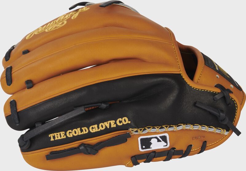 Tan/black back of a Rawlings Heart of the Hide infield/pitcher's glove with the MLB logo on the pinky - SKU: PRO205-9TB