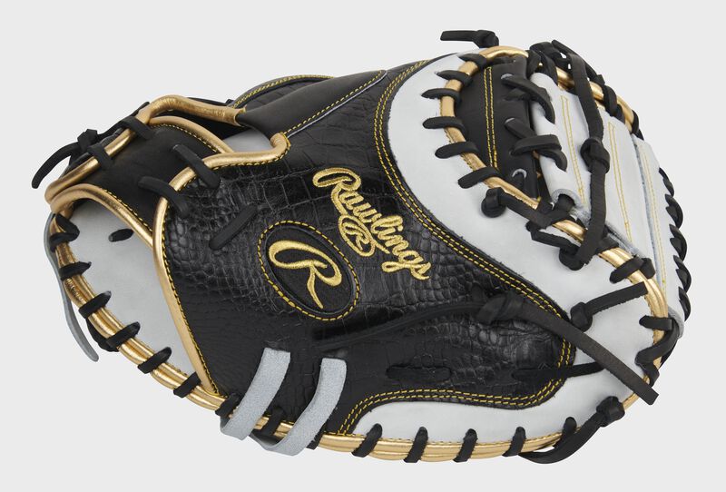 Black thumb of an exclusive Heart of the Hide Croc catcher's mitt with a white 1-piece solid web - SKU: PROCM41BW