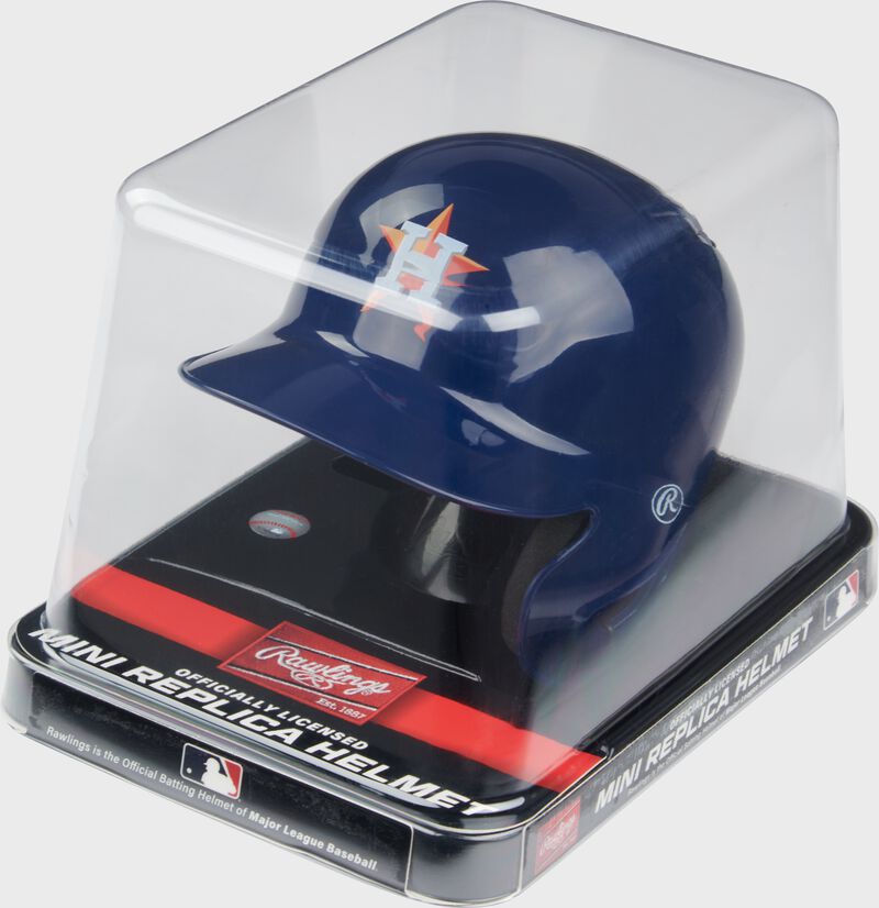 A navy Houston Astros mini replica helmet in a clear packaging case