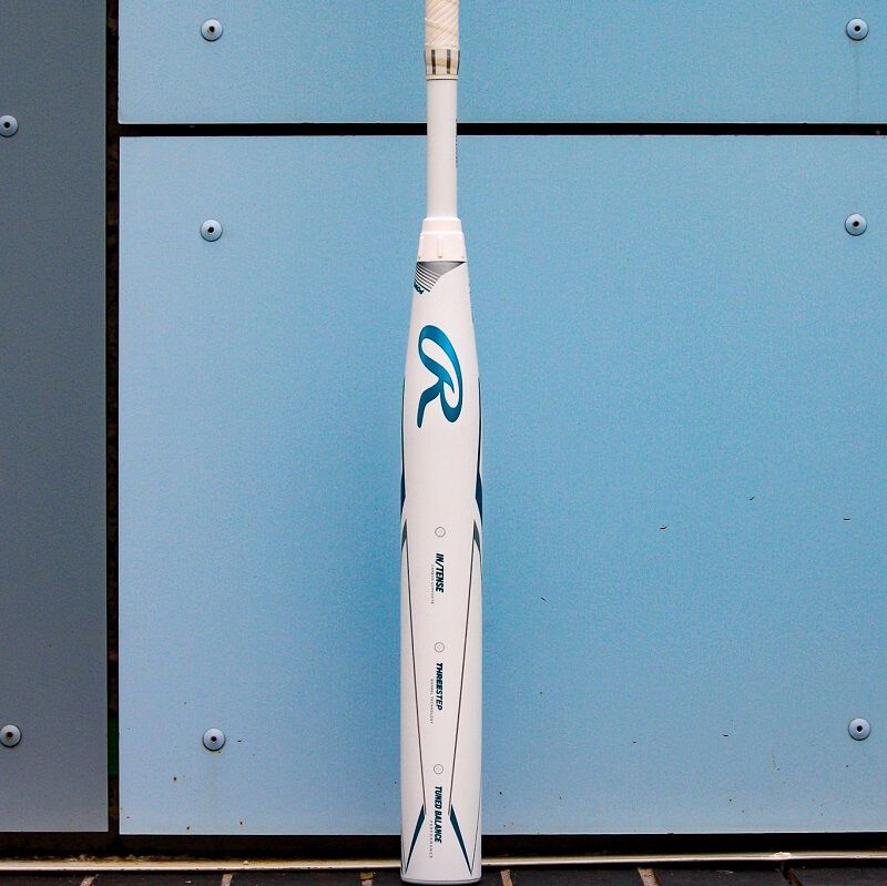 A white Mantra plus+ fastpitch bat in front of a blue wall - SKU: RFP3MP