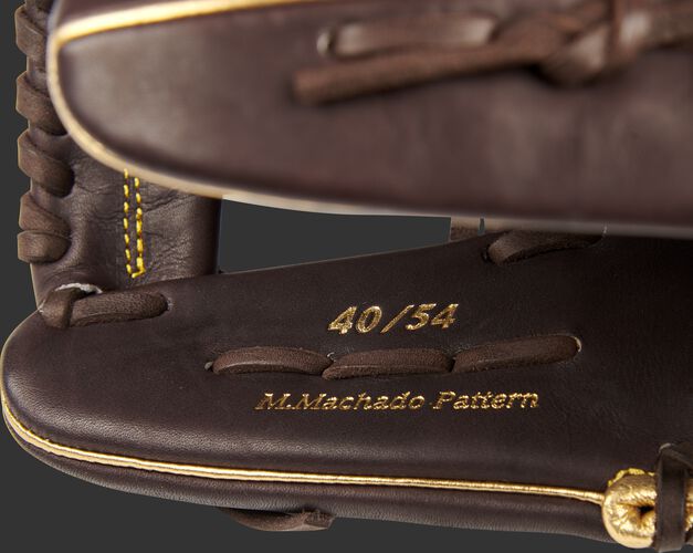 Inside thumb of a Manny Machado Gameday 57 Series glove with a limited edition 40/54 stamp - SKU: PROSNP7-MM13