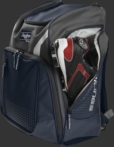 A cleat in the side cleat pocket of a navy Legion baseball backpack - SKU: LEGION-N
