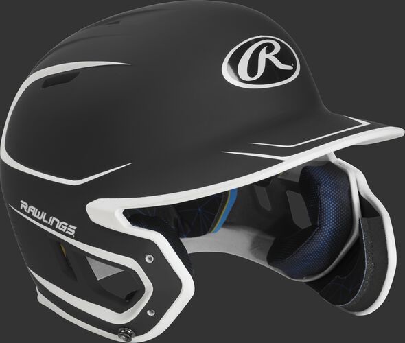 Right angle view of a MACHEXTR Rawlings Mach EXT junior helmet with a two-tone matte black/white shell
