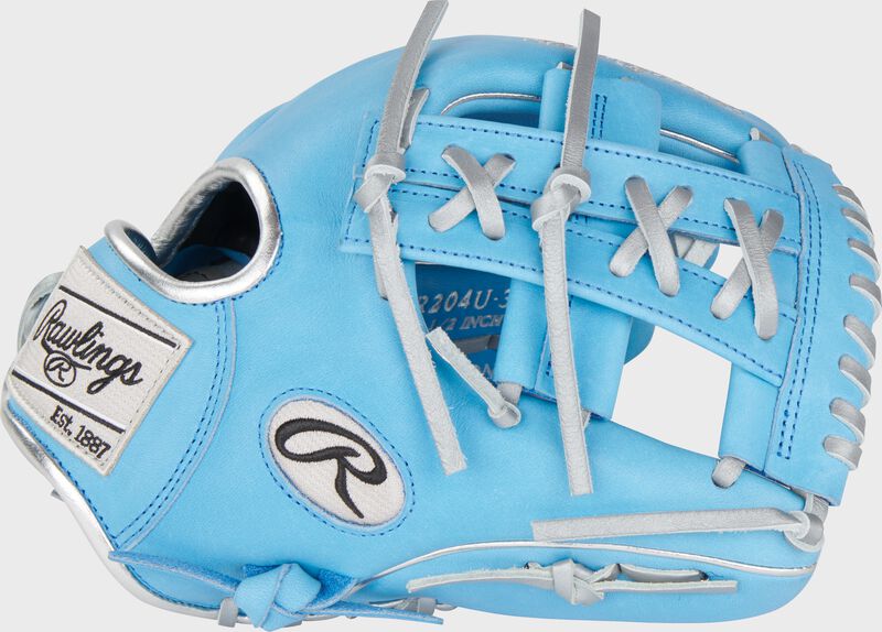 Thumb of a Columbia blue exclusive Heart of the Hide ContoUR fit infield glove with split laced single post web