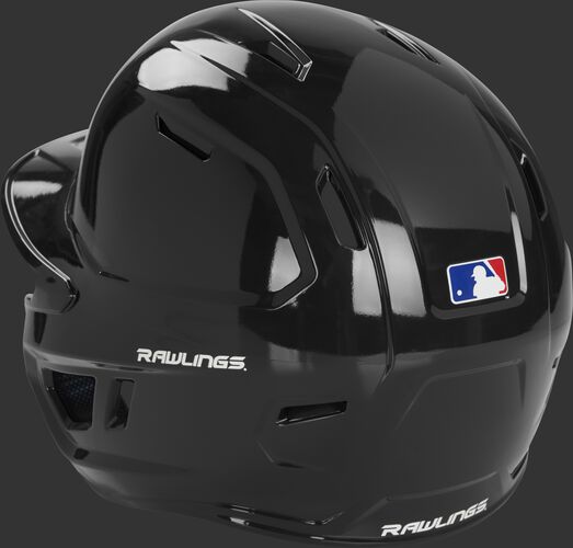 Back left of a black MCH01A Mach helmet with air ventilation holes up the back