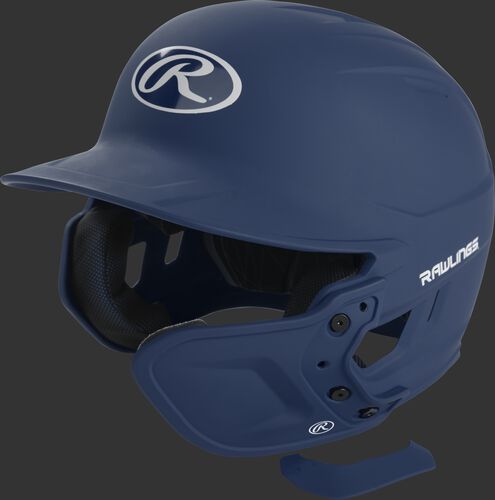 A matte navy MEXT attached to a Mach batting helmet showing the hardware