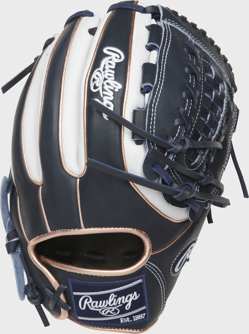 PRO716SB-18NW 12-inch Heart of the Hide softball glove with a navy back, white trim and rose gold double-welting loading=