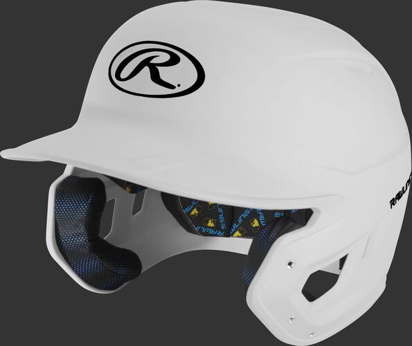 Left angle view of a matte white MCH07A Mach high school/college batting helmet