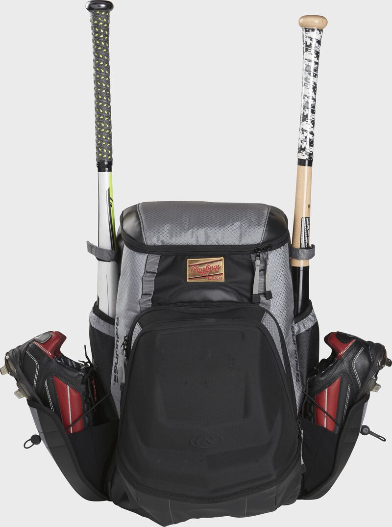 Front of a black/gray R1000 Gold Glove Equipment bag with two cleats and two bats in the side compartments