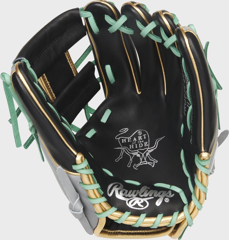 Black palm of a Rawlings Heart of the Hide Hyper Shell infield glove with silver stamping and mint laces - SKU: PRO934-2BCF