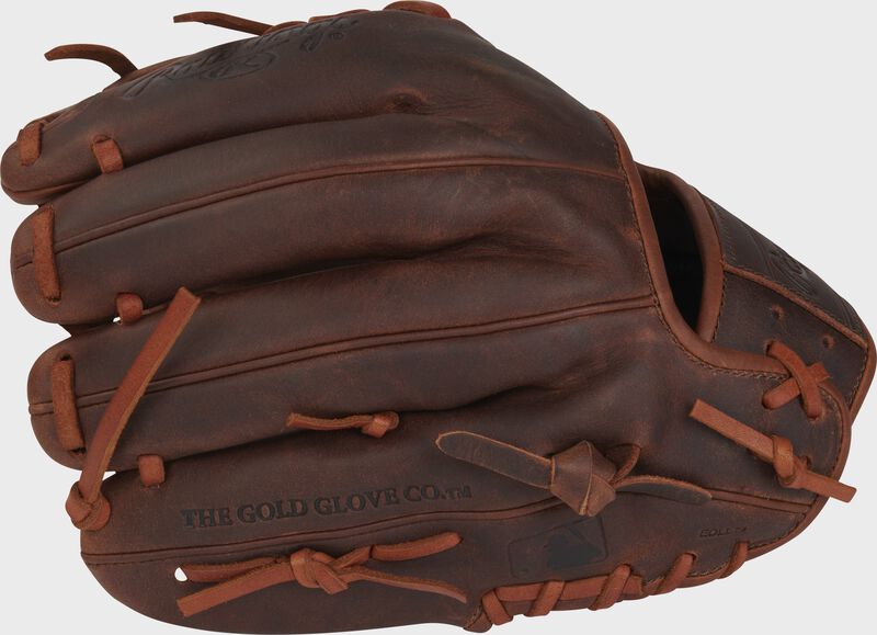 Back of a timberglaze Heart of the Hide 11.5" elements glove with the MLB logo on the pinky - SKU: PRO204-2TI