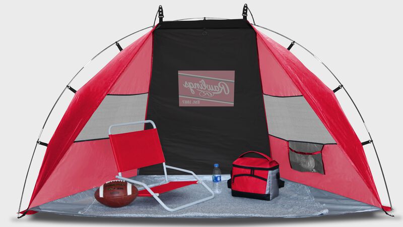 Inside of a red/black Rawlings sun shelter with a chair and cooler inside - SKU:00974043511
