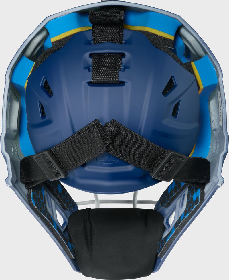 Back of a navy Rawlings Mach Pro Series catcher's helmet loading=